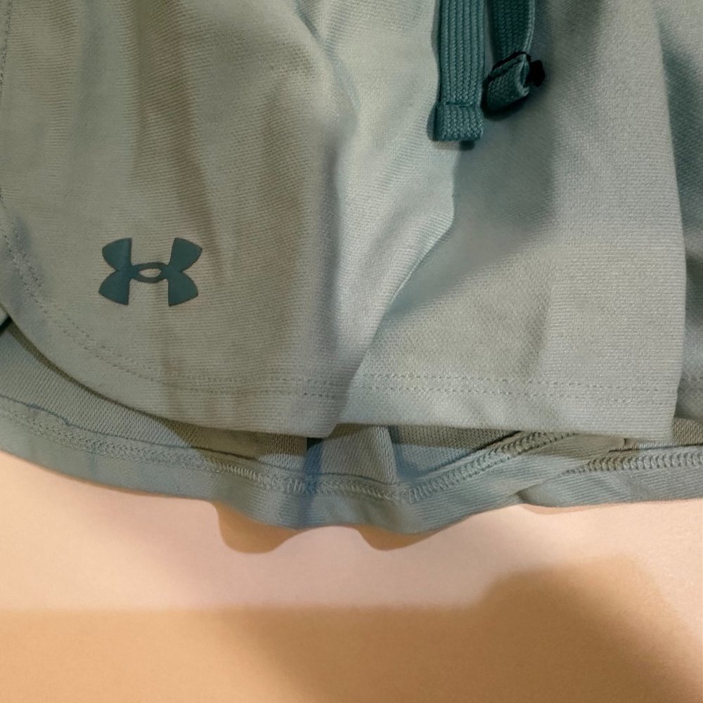 Under Armor teal shorts size- youth medium